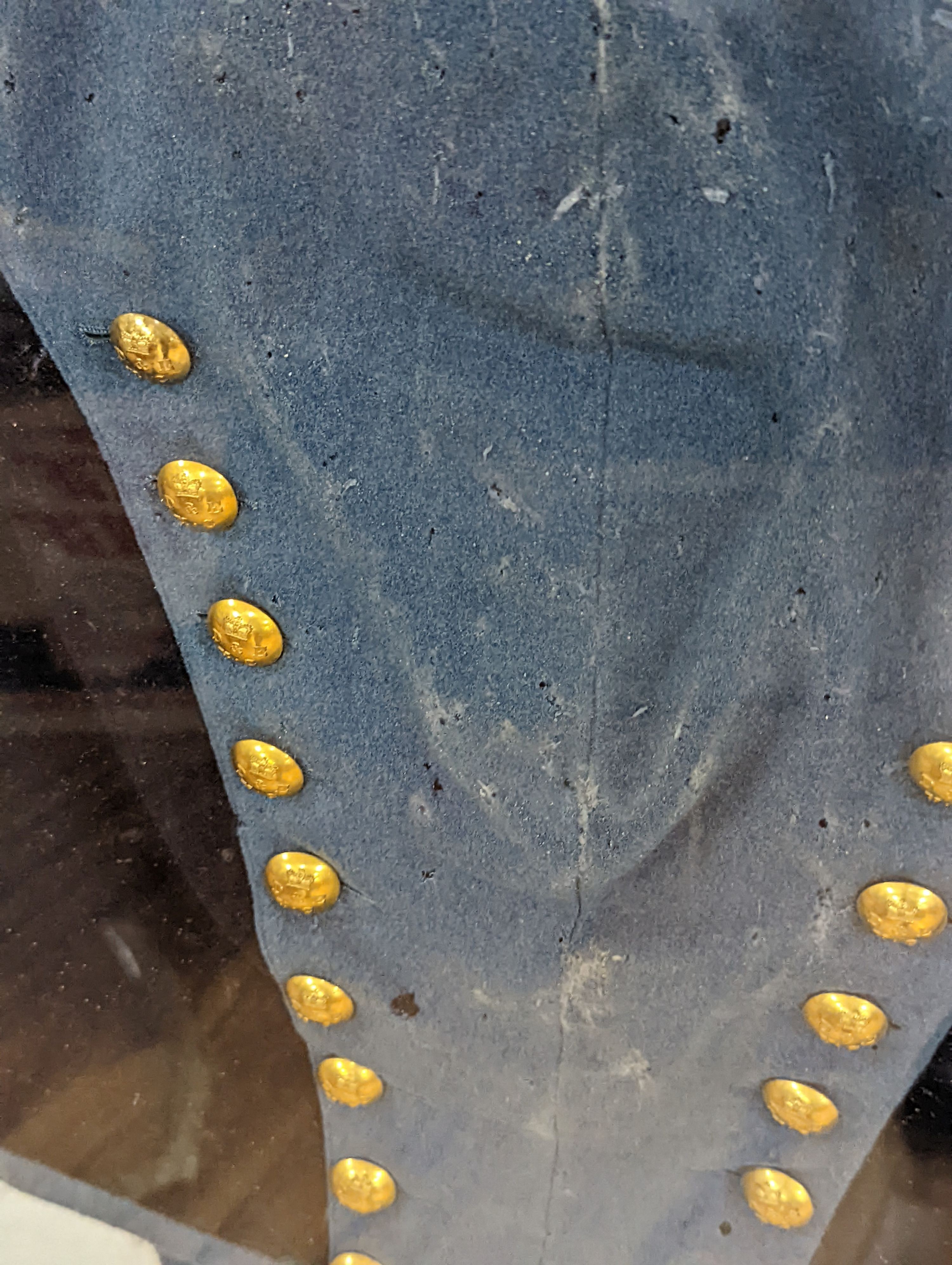 A rare Dart and Erme Yeoman Cavalry felt tunic, c.1822-28, mounted with gilt buttons D & E over Y C, framed and glazed